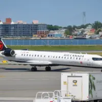 Air Canada Express plane seen at the tarmac of LaGuardia International Airport. LaGuardia Airport^ New York^ USA - August 8^ 2025