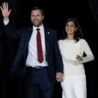 JD Vance arrives with his wife Usha Vance at the Vice Presidential Nominee’s election rally at the Cobb Galleria Center in Atlanta^ Georgia. Atlanta^ Georgia^ USA - 4th Nov^ 2024