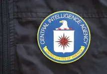 United States of America Central Intelligence Agency coat of arms as pin on black uniform jacket close up