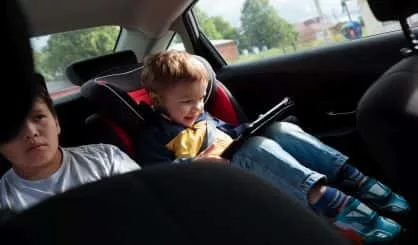 two-boys-on-the-back-seat-of-a-car