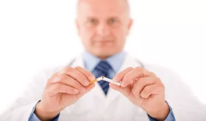 stop-smoking-mature-male-doctor-break-cigarette