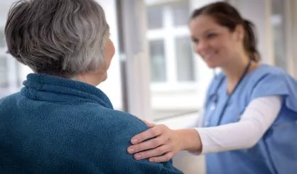 nurse-comforting-elderly-patient