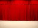 red-draped-theater-stage-curtains