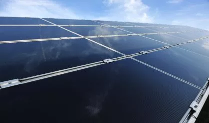 alternative-energy-photovoltaic-solar-panels-against-blue-sky