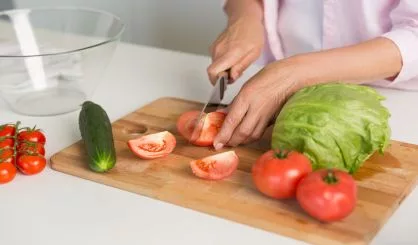 cropped-picture-of-mature-woman-cooking