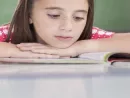 girl-reading-at-school