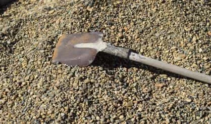 shovel-on-crushed-stone