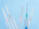 syringes-with-liquid-drop-falling-from-needle