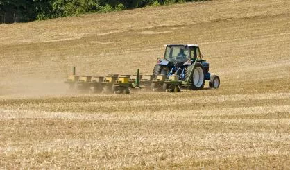 farmer-seeding-field-2