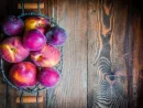 peaches-on-wooden-background