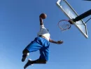 man-dunking-a-basketball
