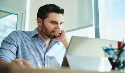 worried-businessman-got-virus-and-data-loss-on-laptop-computer