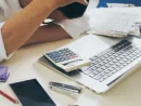 man-counting-using-calculator-and-stress-in-problem-with-expenses