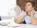 businessman-in-office-with-computer-and-fan-cooling-off-2