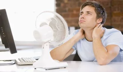 businessman-in-office-with-computer-and-fan-cooling-off-2