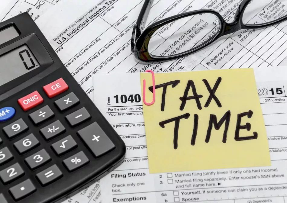 tax-form-with-callculator-and-glasses