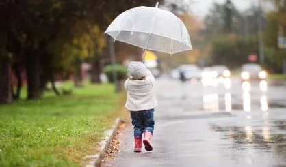 little-girl-under-the-transparent-umbrella-outside-rainy-day