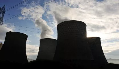 coal-fired-power-station-with-cooling-towers-releasing-steam-int-2