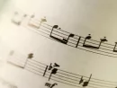closeup-of-old-sheet-music-with-selective-focus-and-very-shallow-dof