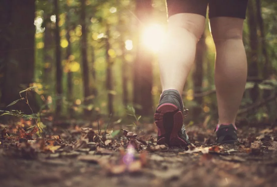 woman-walking-through-forest