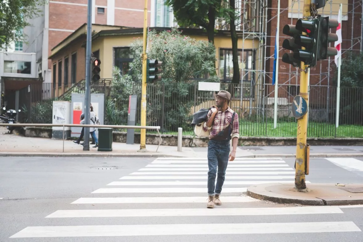 young-handsome-afro-black-man-walking-on-pedestrian-crossing-lo