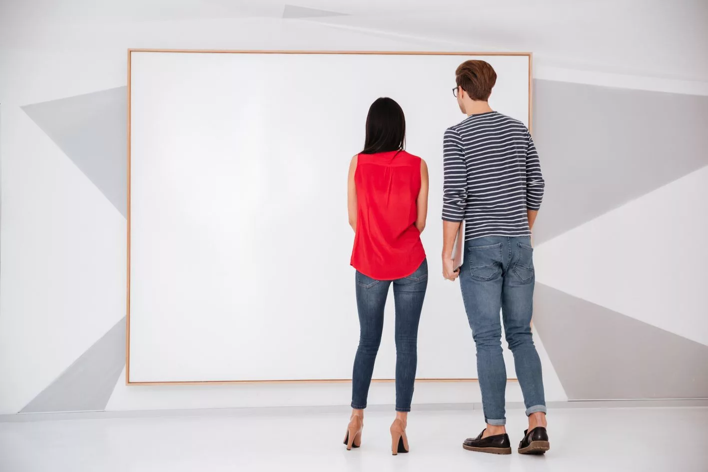 back-view-of-young-couple-on-exhibition