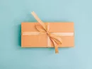 cardboard-gift-box-with-a-beige-ribbon