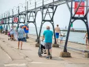 couple-enjoying-the-south-pier-in-south-haven