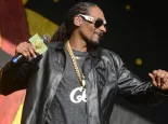 Snoop Dogg performs at the 2017 New Orleans Jazz and Heritage Festival. New Orleans^ Louisiana - May 6^ 2017