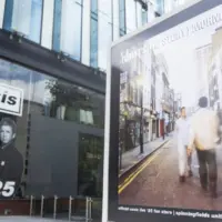 Oasis album cover artwork on display outside the Oasis live 25 shop in Manchester Manchester^ UK - 26 June 2025