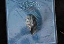 Vinyl cover art of Eagles Their Greatest Hits 1971-1975^ featuring rock music.