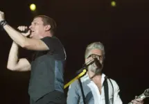Matchbox 20 band vocalist Rob Thomas (L) performs during the Rock in Rio concert^ on September 20^ 2013 in Rio de Janeiro^ Brazil.