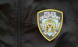 NYPD Police patch on black jacket uniform close up