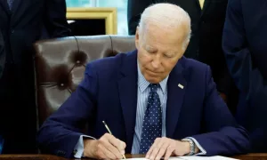 U.S. President Joe Biden signs a proclamation in the Oval Office of the White House. WASHINGTON^ DC - AUGUST 16