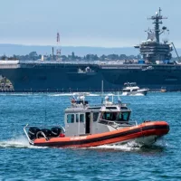 A photo of a U.S. Coast Guard cutter boat in the Tuna Harbor area. SAN DIEGO^ CA/U.S.A. - AUGUST 17^ 2019