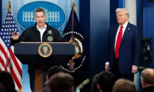 Sean Duffy^ Transportation Secretary^ speaks at a White House press briefing. Pres. Donald Trump also pictured