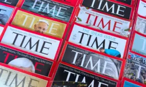 Colorful close-up of overlapping TIME Magazine covers^ highlighting diverse headlines on world leaders^ politics^ business^ and social issues. Calgary^ Alberta^ Canada. Dec 1^ 2025
