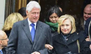 Bill & Hillary Clinton at funeral services held for former New York governor Mario Cuomo at St. Ignatius Loyola Church on Manhattan's Upper East Side. NEW YORK CITY - JANUARY 6 2015