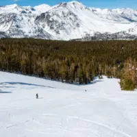 Unknown skiers have the hill to themselves at June Mountain Ski Resort^ a small resort tucked away in the Eastern Sierra Nevada mountains in California.