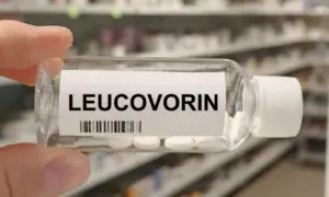 Bottle of LEUCOVORIN tablets on a hospital pharmacy table used to reduce methotrexate toxicity a folinic acid supplement.