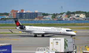 Air Canada Express plane seen at the tarmac of LaGuardia International Airport. LaGuardia Airport^ New York^ USA - August 8^ 2025