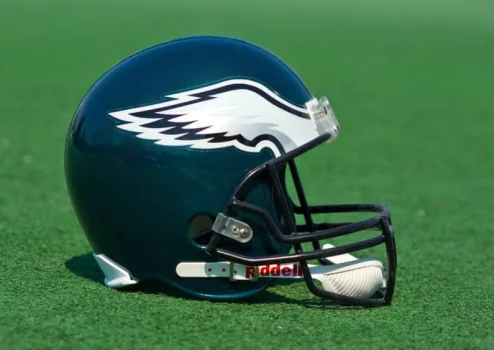 Philadelphia eagles NFL club helmet on the green playing field ^ product shot