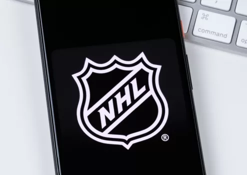 NHL app logo on a smartphone screen.