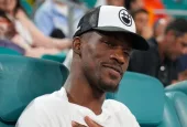 Jimmy Butler^ basketball player for the Miami Heat^ attends the semifinal match at 2023 Miami Open at the Hard Rock Stadium in Miami MIAMI GARDENS^ FLORIDA - MARCH 31^ 2023