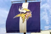 Minnesota Vikings practice facility and flag. The Minnesota Vikings are a professional American football team based in Minneapolis^ Minnesota. EDEN PRAIRIE^ MN/USA - August 13^ 2015