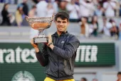 Roland Garros champion Carlos Alcaraz of Spain during trophy presentation after men's final match victory against Alexander Zverev of Germany in Paris^ France. PARIS^ FRANCE - JUNE 9^ 2024