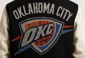 OKLAHOMA CITY THUNDER IN ALL RHINESTONES AS PATCH ON BACK OF MENS VARSITY JACKET
