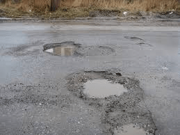 Road Crews Patch Potholes On China Hat - Vimarsana News