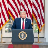 wh_52220_trumppodiumflags