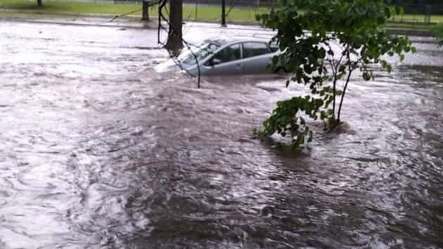 'Unbelievable I'm alive': Woman survives after car swept away in flash ...